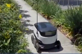 [视频]最“酷”快递：面包车搭载自动送货机器人